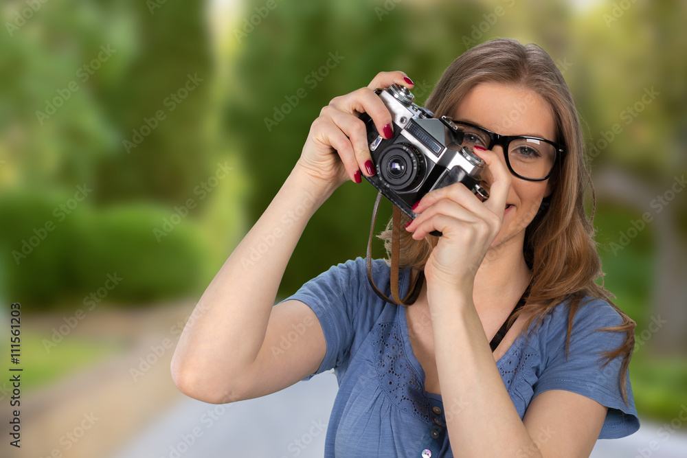 Woman photographer with camera