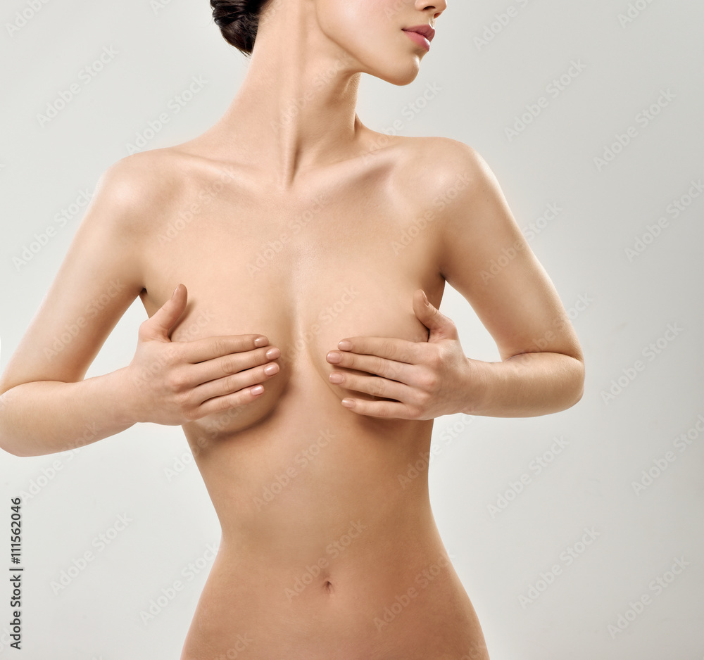 Beautiful young woman with clean skin nude topless breasts. Beau Beautiful young woman with clean skin nude topless breasts. Beau