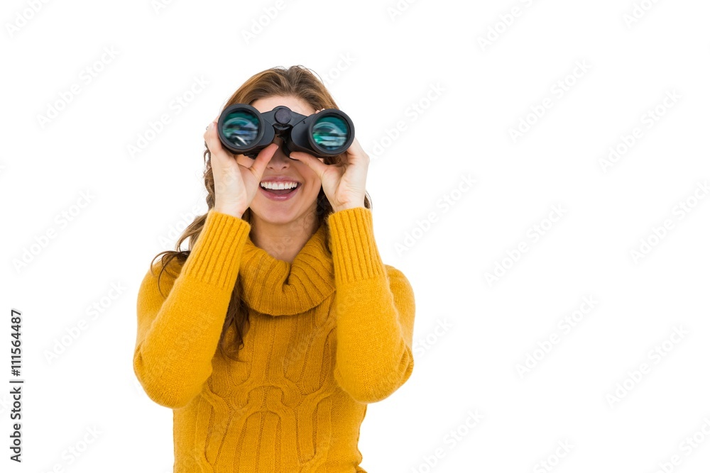 Young woman looking through binoculars Young woman looking through binoculars