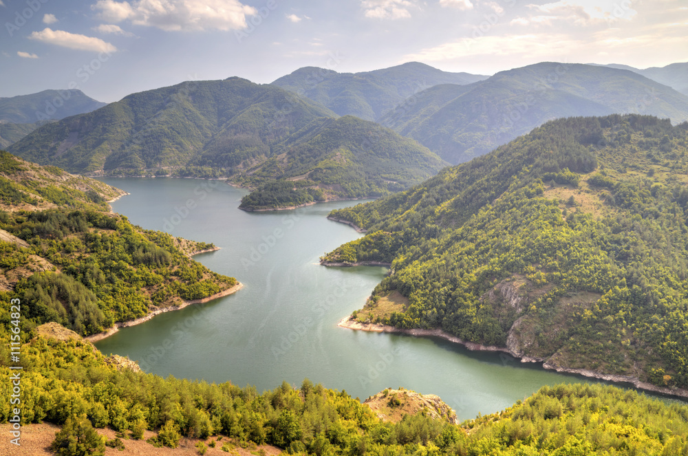 Beautiful landscape with dam in the mountain