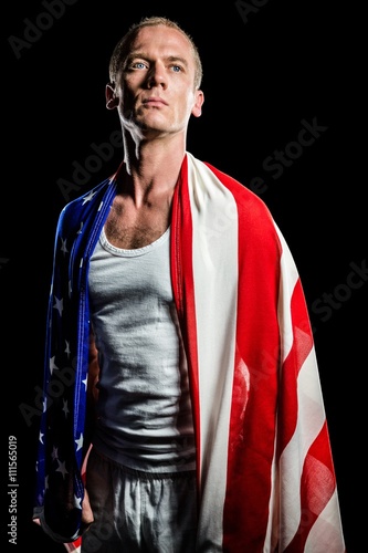Athlete with american flag wrapped on his body
