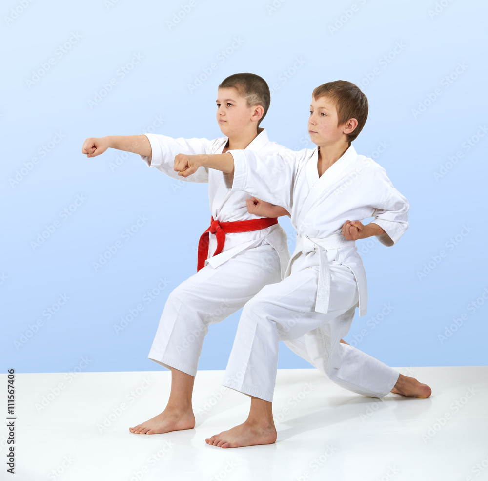 Punch arm athletes are beating in karategi Punch arm athletes are beating in karategi