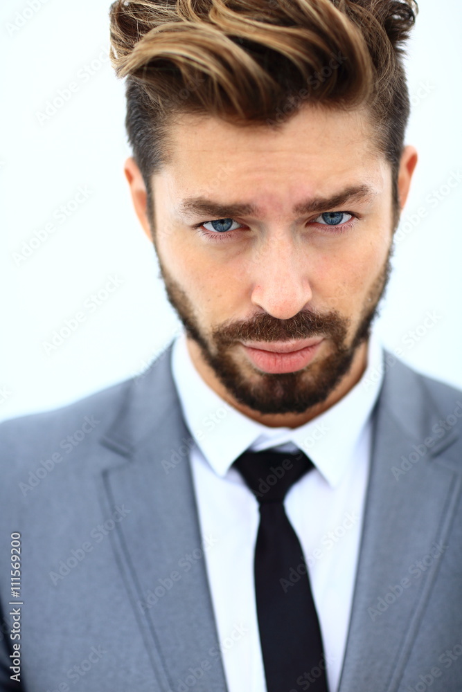 Portrait ofyoung business man, isolated on white background Portrait ofyoung business man, isolated on white background