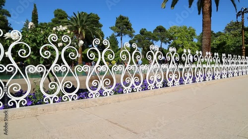 in iran antique garden with lots of different flowers in the wind. photo