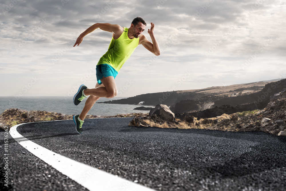 Male runner sprinting during outdoors training for marathon run Male runner sprinting during outdoors training for marathon run