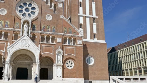 SZEGED, HUNGARY - MAY 22, 2016: Votive Church of Our Lady of Hungary in Szeged. Construction began in 1913 and it was completed at 1930. 4K footage.