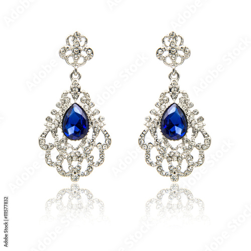 Pair of sapphire earrings isolated on white 