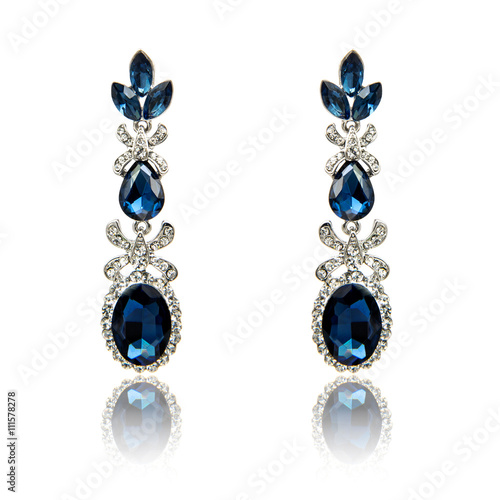 Pair of sapphire earrings isolated on white 