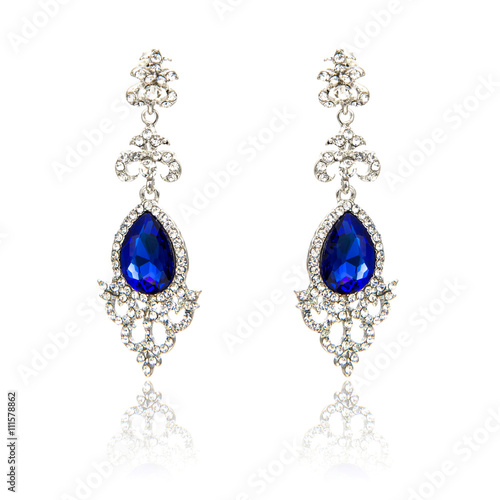 Pair of sapphire earrings isolated on white 