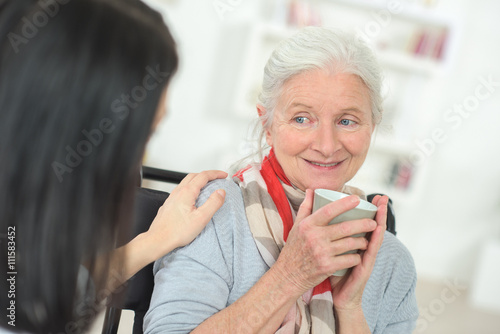 Doctor checking up on a senior patient
