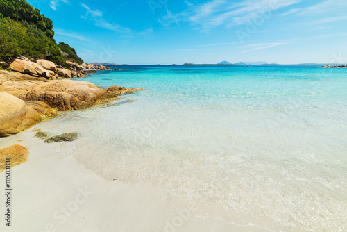 white sand and blue sea in Capriccioli beach