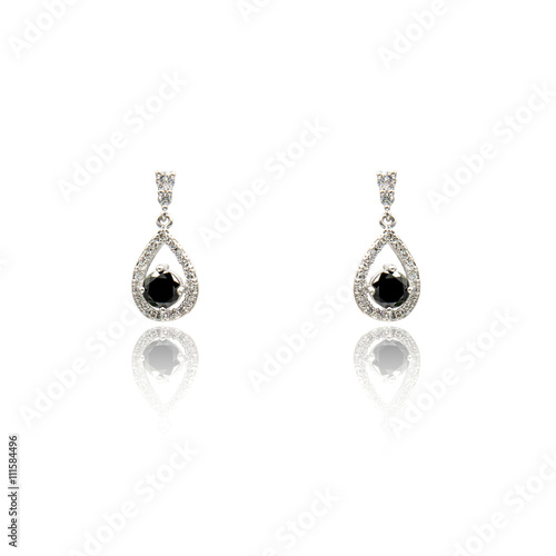 Pair of black spinel diamond earrings isolated on white 