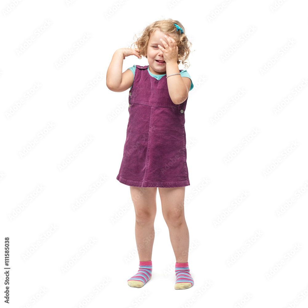 Naklejka premium Young little girl standing over isolated white background