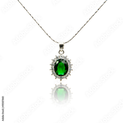 Emerald pendant isolated on white 