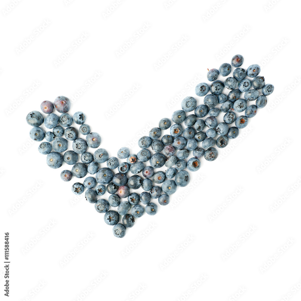 Yes tick sign symbol mark made of Bilberry or blueberry over isolated white background Yes tick sign symbol mark made of Bilberry or blueberry over isolated white background