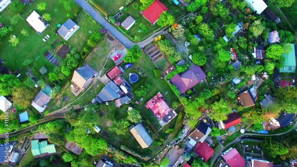 Aerial view of urban landscape with forest. Civilization and nature. Environmentally friendly living. 