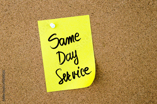 Same Day Service written on yellow paper note