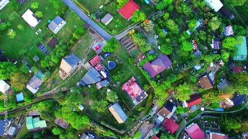 Aerial view of urban landscape with forest. Civilization and nature. Environmentally friendly living.  photo