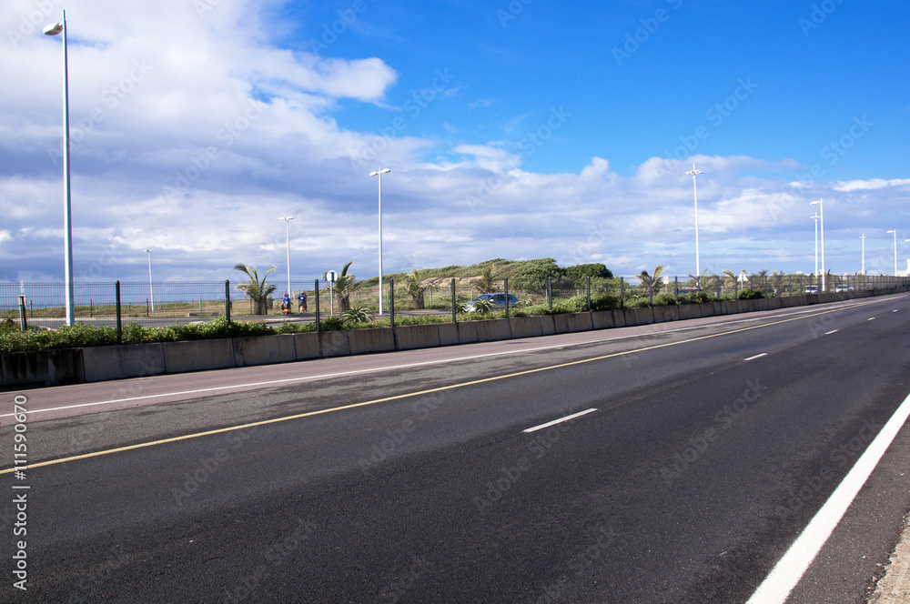 Empty Beachfront Highway Heading into City Center Empty Beachfront Highway Heading into City Center