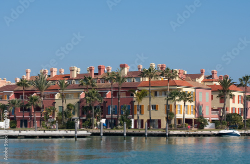 A row of colourful spanish waterside properties © rocklights