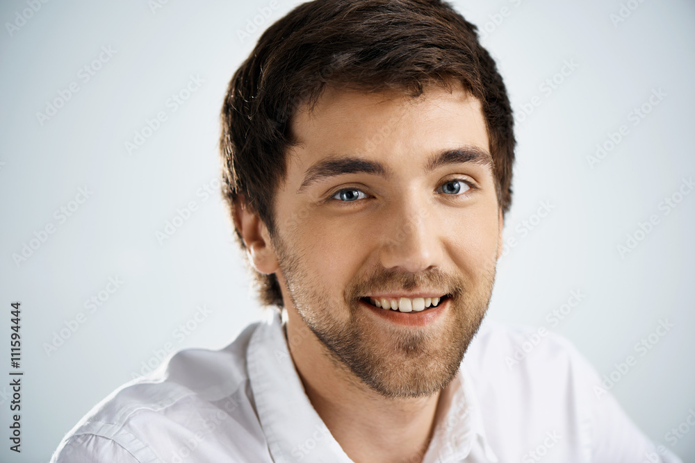 Close up portrait of smiling elegant confident handsome young bu Close up portrait of smiling elegant confident handsome young bu