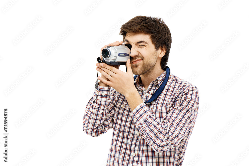 Portrait of handsome young man shooting video on handy cam Portrait of handsome young man shooting video on handy cam