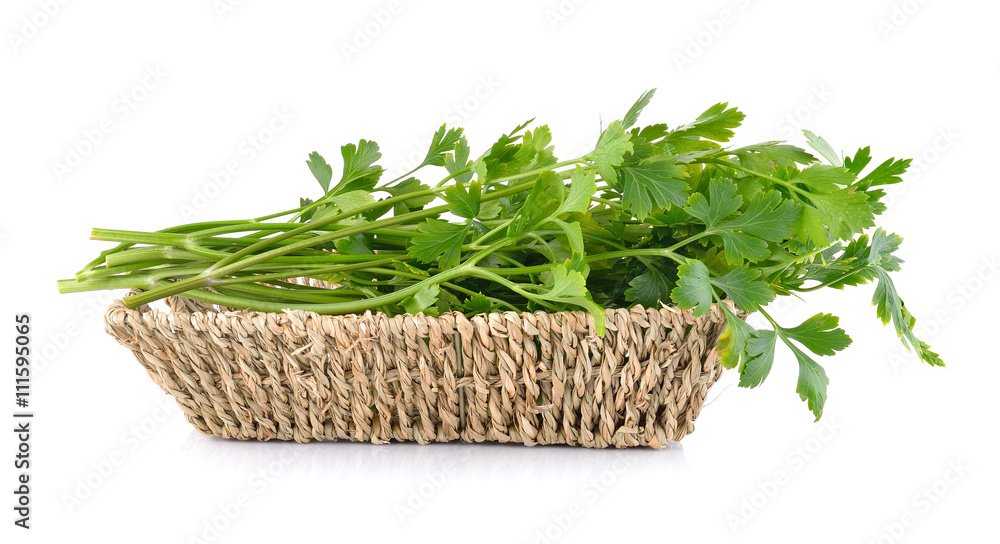 Parsley in basket isolated on white background Parsley in basket isolated on white background