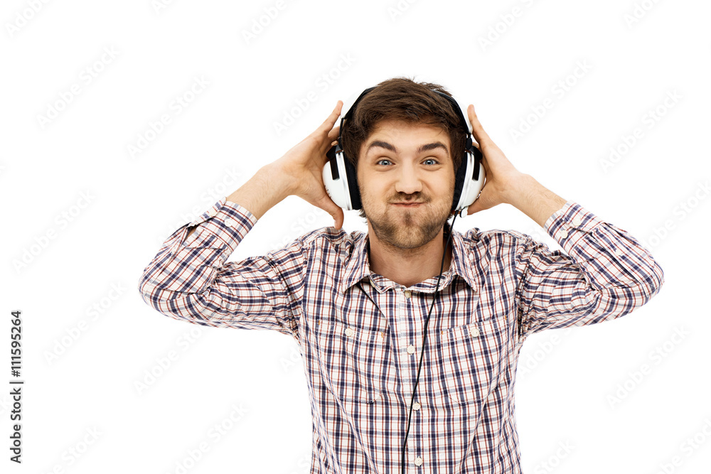 Portrait of handsome funny young man, in head phones Portrait of handsome funny young man, in head phones