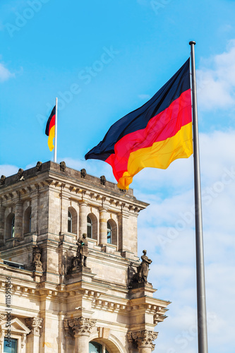 Canvas Print German Reichstag in Berlin, Germany, with national flags