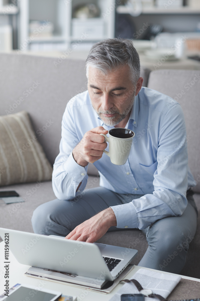Businessman having a coffee break Businessman having a coffee break