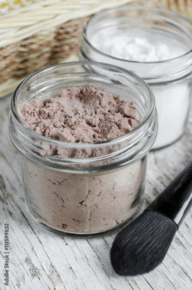 Homemade dry shampoo in a glass jar, close up Homemade dry shampoo in a glass jar, close up