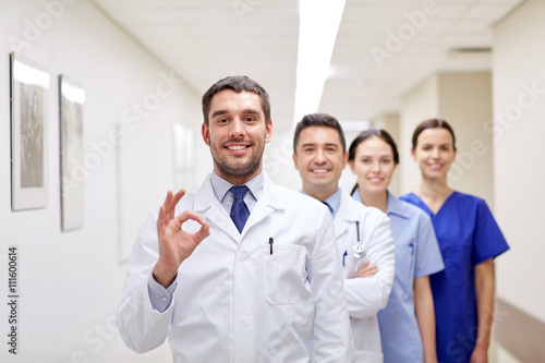 group of happy medics or doctors at hospital