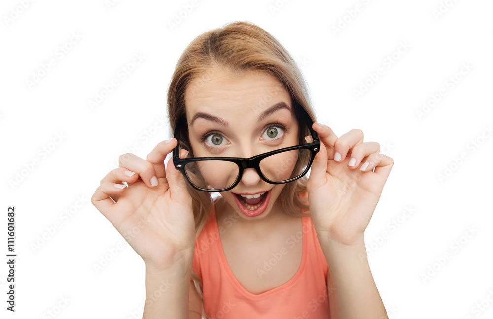 happy young woman or teenage girl in eyeglasses happy young woman or teenage girl in eyeglasses