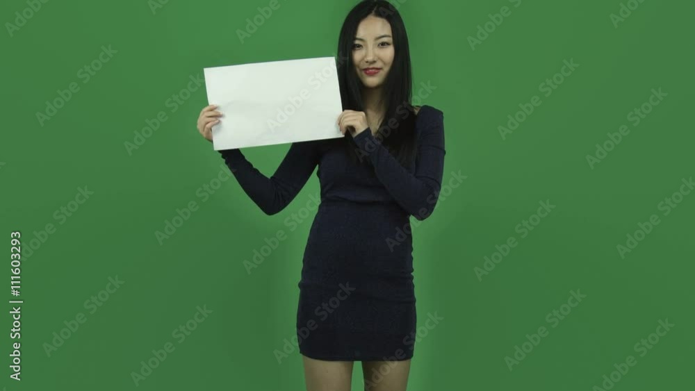 Asian girl young adult evening dress isolated greenscreen green background happy blank sign Asian girl young adult evening dress isolated greenscreen green background happy blank sign