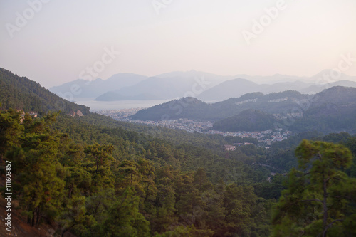 Evening view of the city of Marmaris, the mountains and the sea