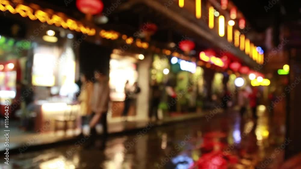 People walking in city night background People walking in city night background