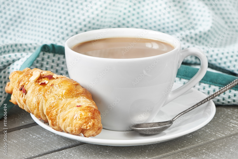 Coffee with milk and croissant Coffee with milk and croissant