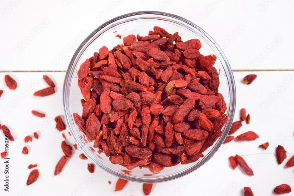 Goji berries on the wooden table Goji berries on the wooden table