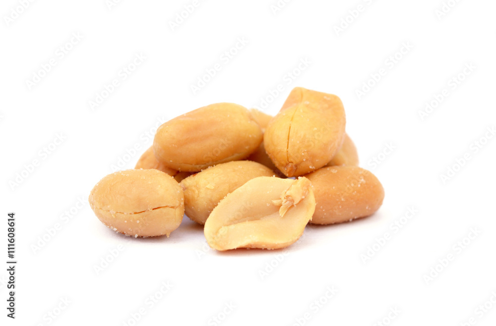Roasted salted peanuts isolated on a white background Roasted salted peanuts isolated on a white background