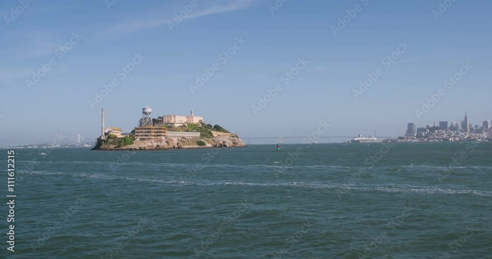 Boat view from water of Alcatraz and city of San Francisco in background.
Boat view from water of Alcatraz and city of San Francisco in background.
