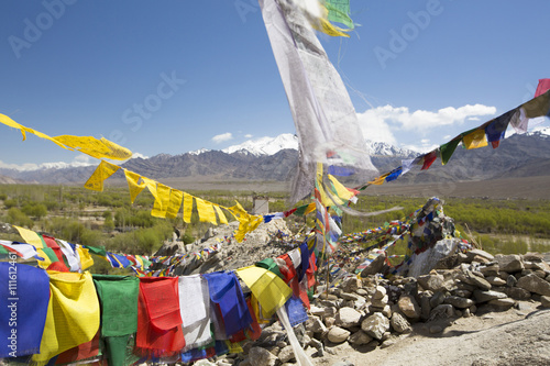 Tibetan prayer flags at Shey Palace, Ladakh, India photo