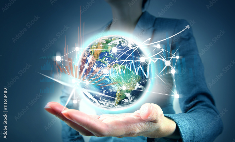 Modern technology in hand. Elements of this image furnished by NASA Modern technology in hand. Elements of this image furnished by NASA