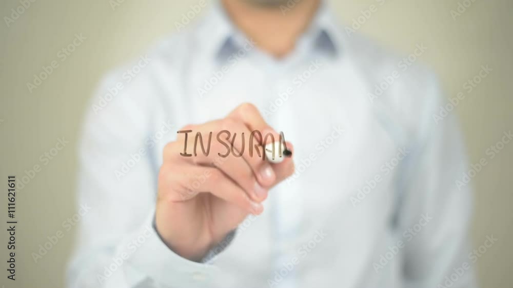 Insurance Law, man writing on transparent screen Insurance Law, man writing on transparent screen