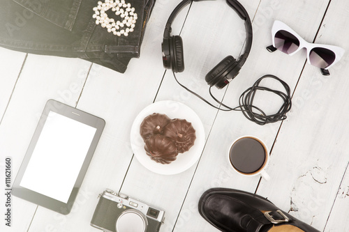 shoes, jeans, tablet pc, camera, headphones, sunglasses, coffee