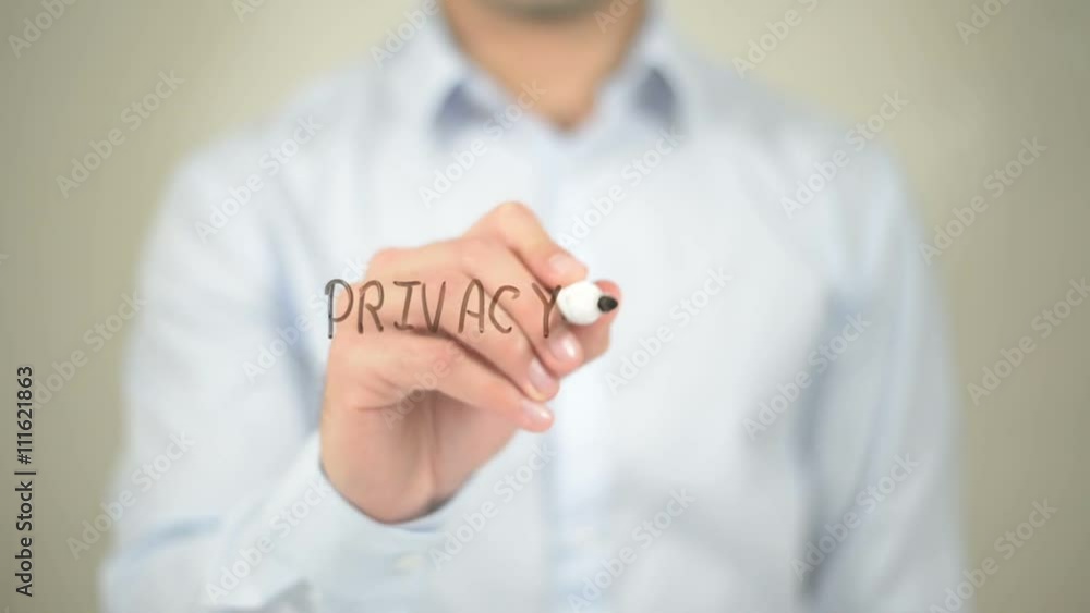 Privacy Law, man writing on transparent screen Privacy Law, man writing on transparent screen