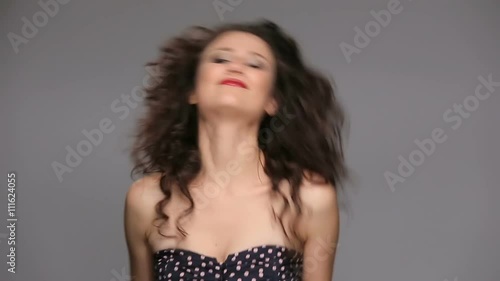 Wallpaper Mural Young brunette with long brown curly hair dancing  Torontodigital.ca