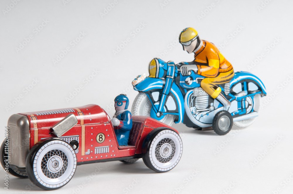 Retro toy car and motorbike racing