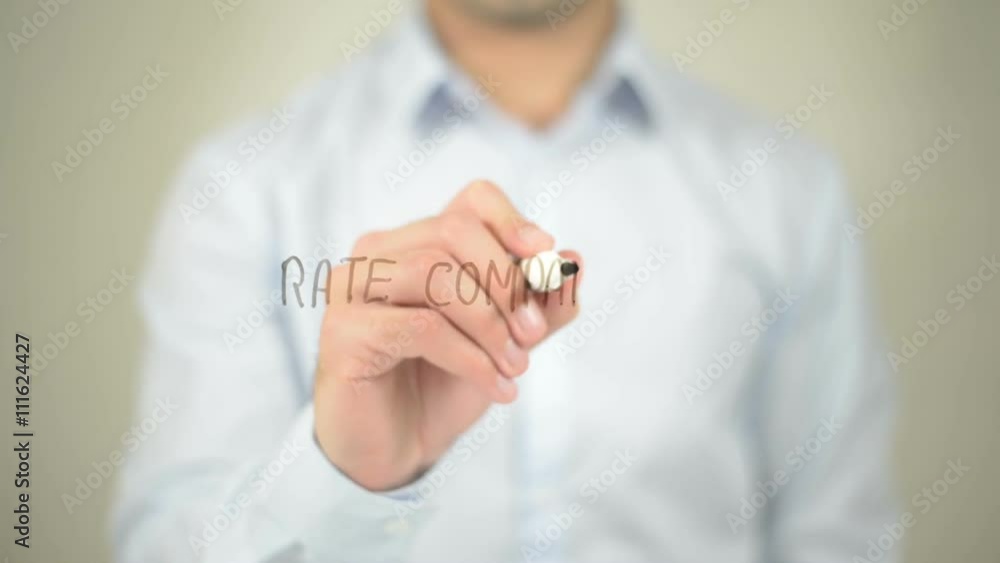 Rate Comparison , man writing on transparent screen Rate Comparison , man writing on transparent screen
