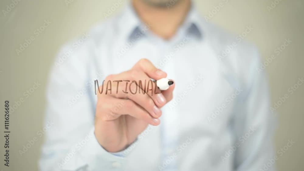 National Debt , man writing on transparent screen National Debt , man writing on transparent screen