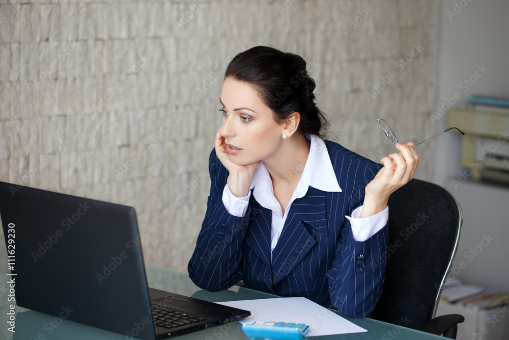Frightened businesswoman got virus on laptop Frightened businesswoman got virus on laptop